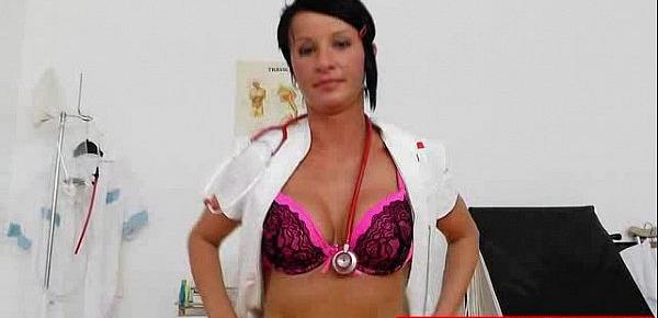  Lady nurse practitioner playing with herself with gyno-tool